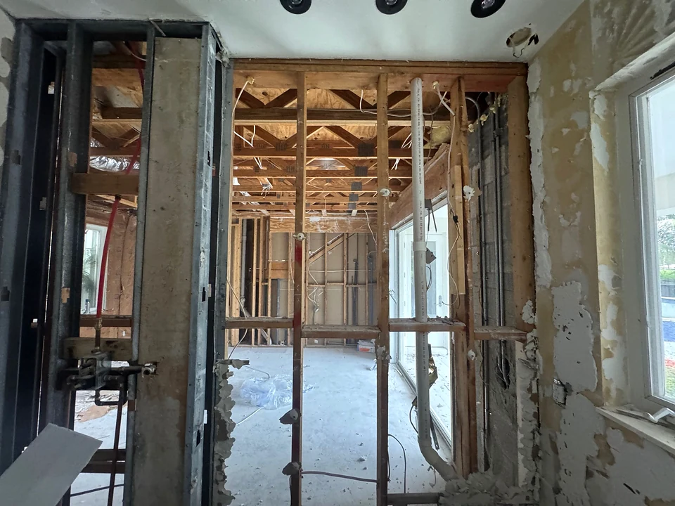 Guest bathroom wall framing opened up during demolition