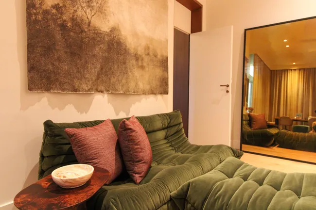 Upholstered seating and layered interior textures