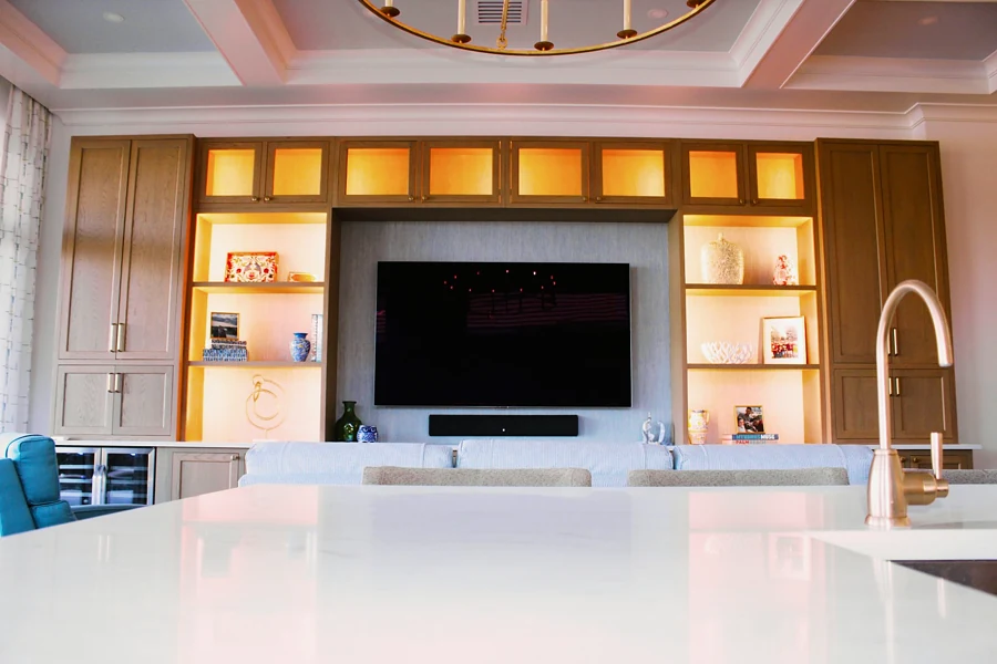 Living room with custom shelving and integrated lighting