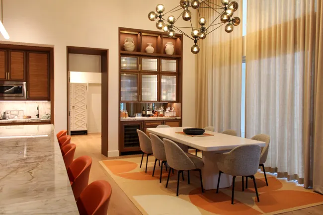 Dining area with integrated storage and architectural lighting