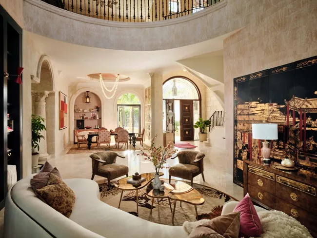 Double-height living space and architectural arches