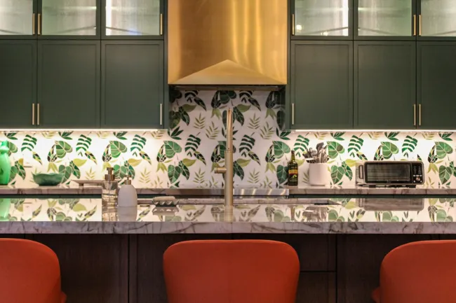 Kitchen cabinetry and expressive backsplash