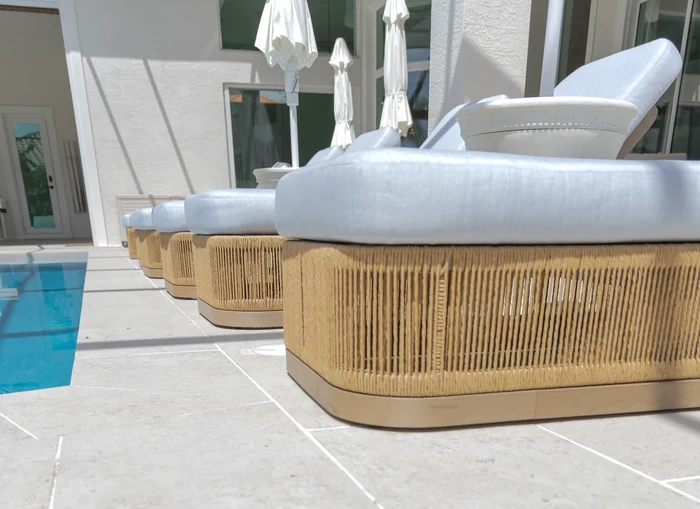 Poolside woven lounges at Audubon Trace