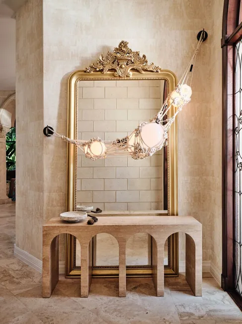 Sculptural vanity and decorative lighting